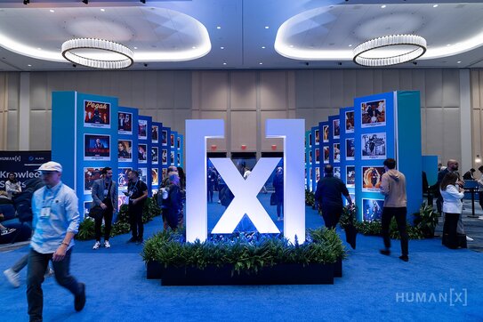 Attendees sit in a circle in an interactive session at HumanX 2025