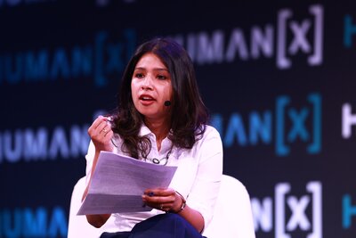 a moderator hosts a center stage interview at humanx